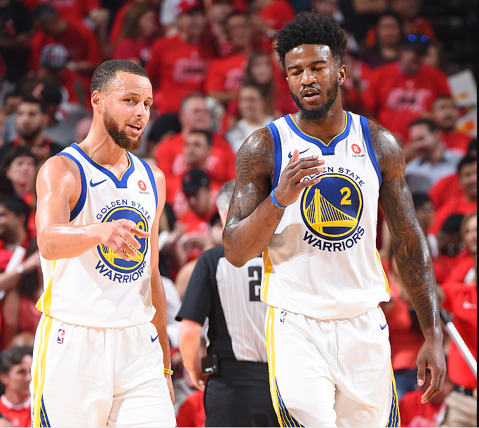 肯·葛瑞菲父子在赛前共同练习，这一幕被摄影师拍下并成为经典海报